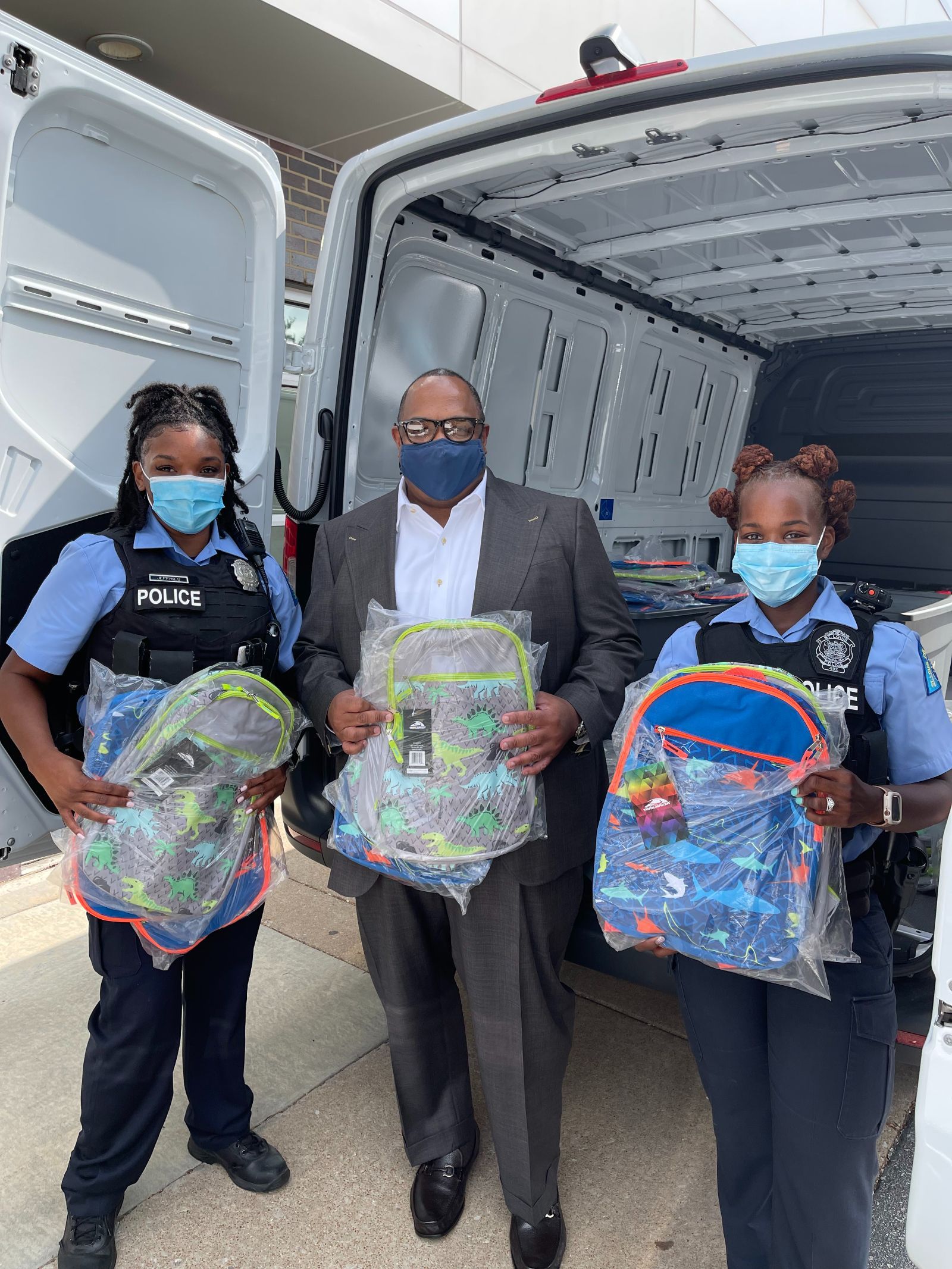 Rickey Whittington and Two Female Police Officers