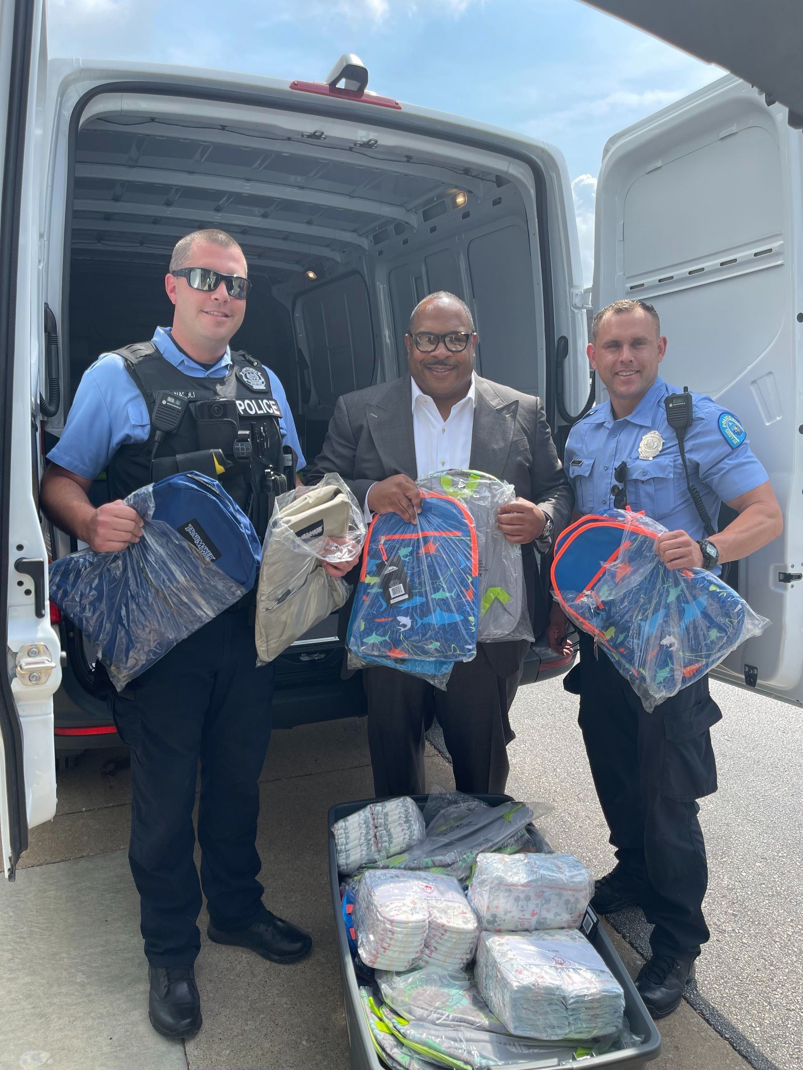 Rickey Whittington and Two Male Police Officers