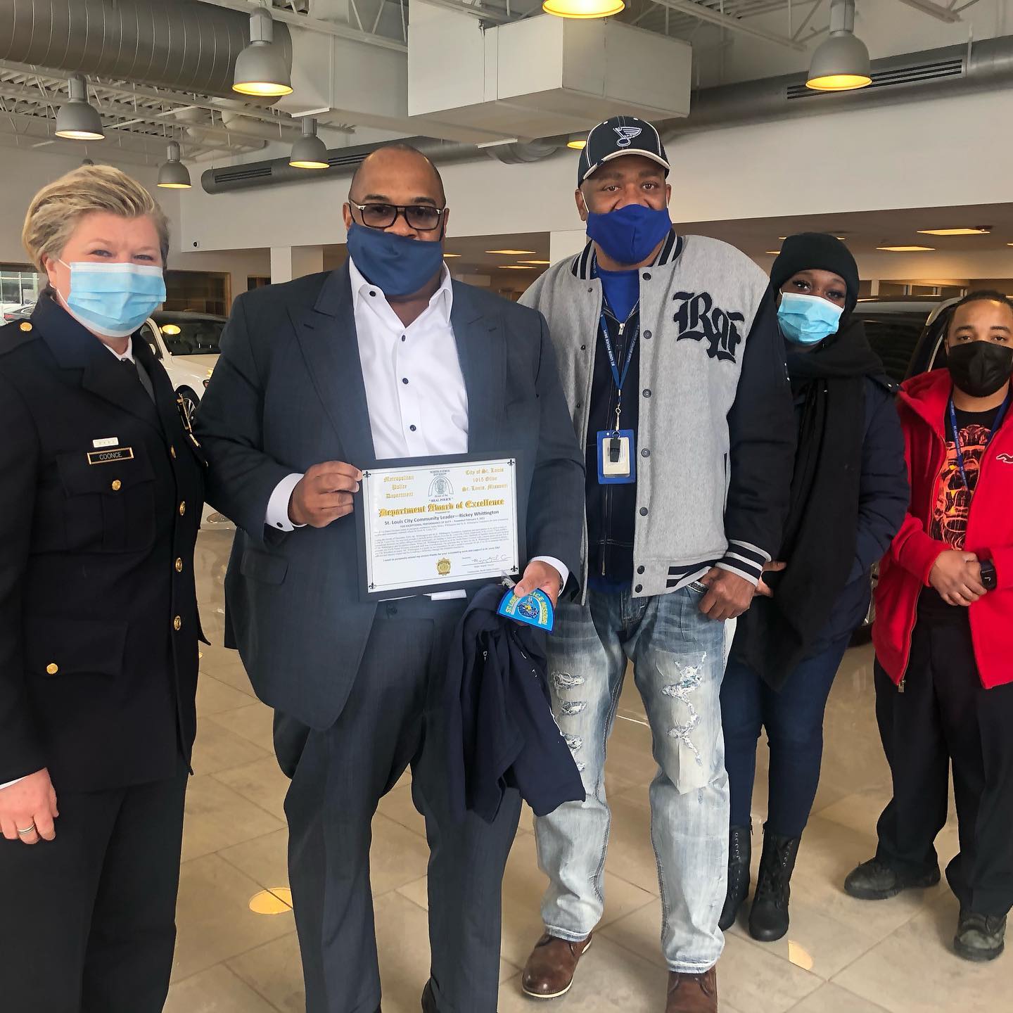 Rickey Whittington Holding a Cerficate