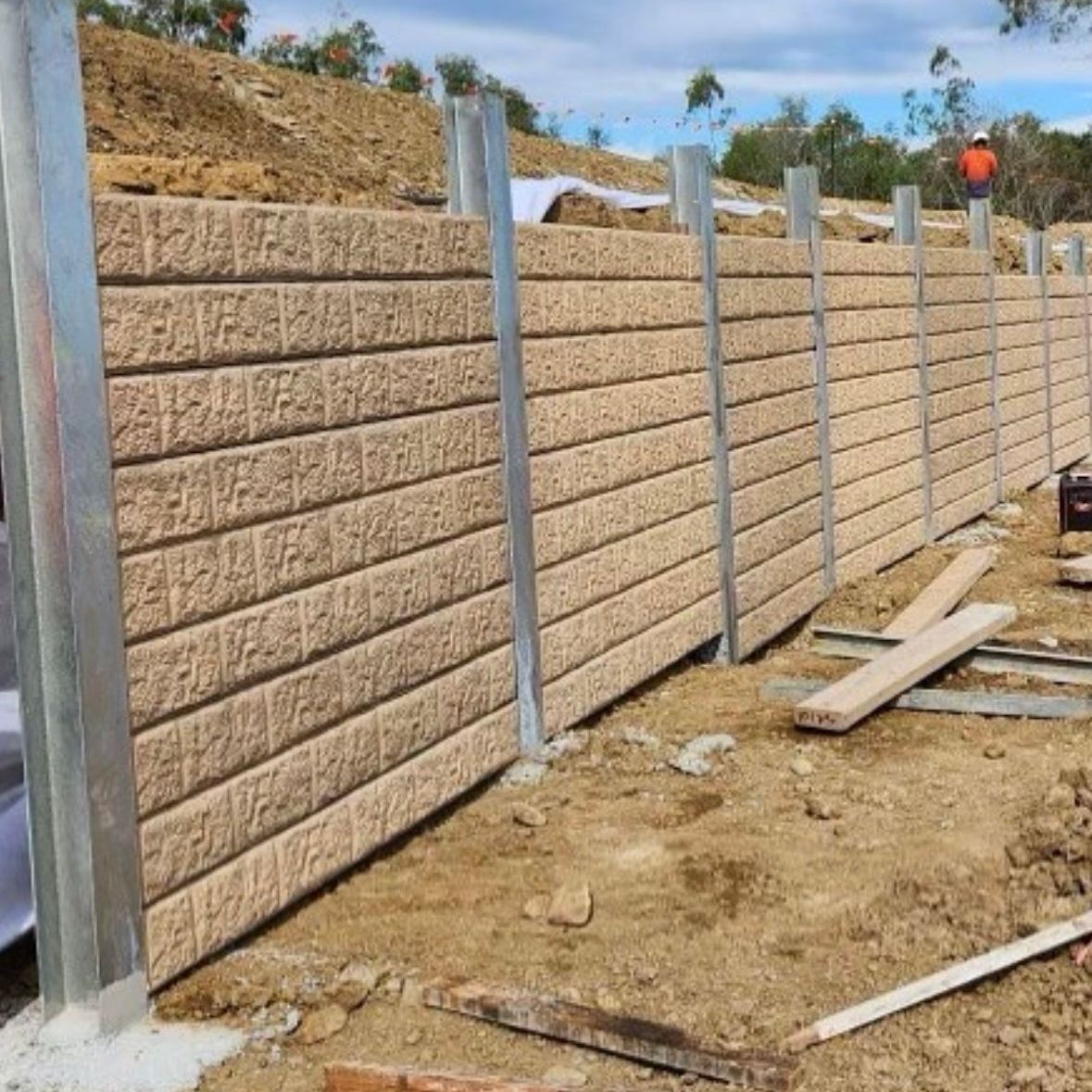 A concrete retaining wall block.