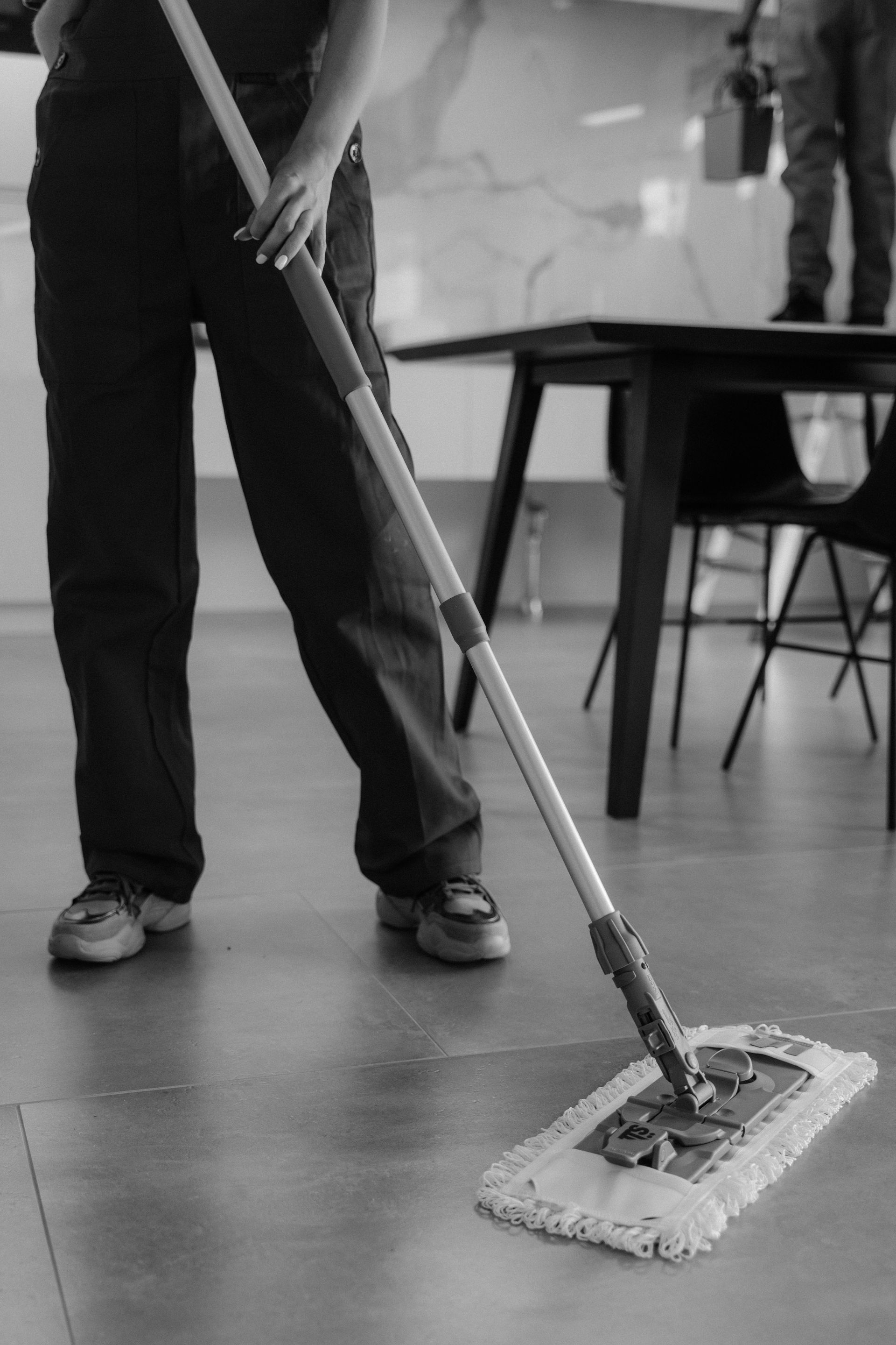 Workers focusing on cleaning the entire office space
