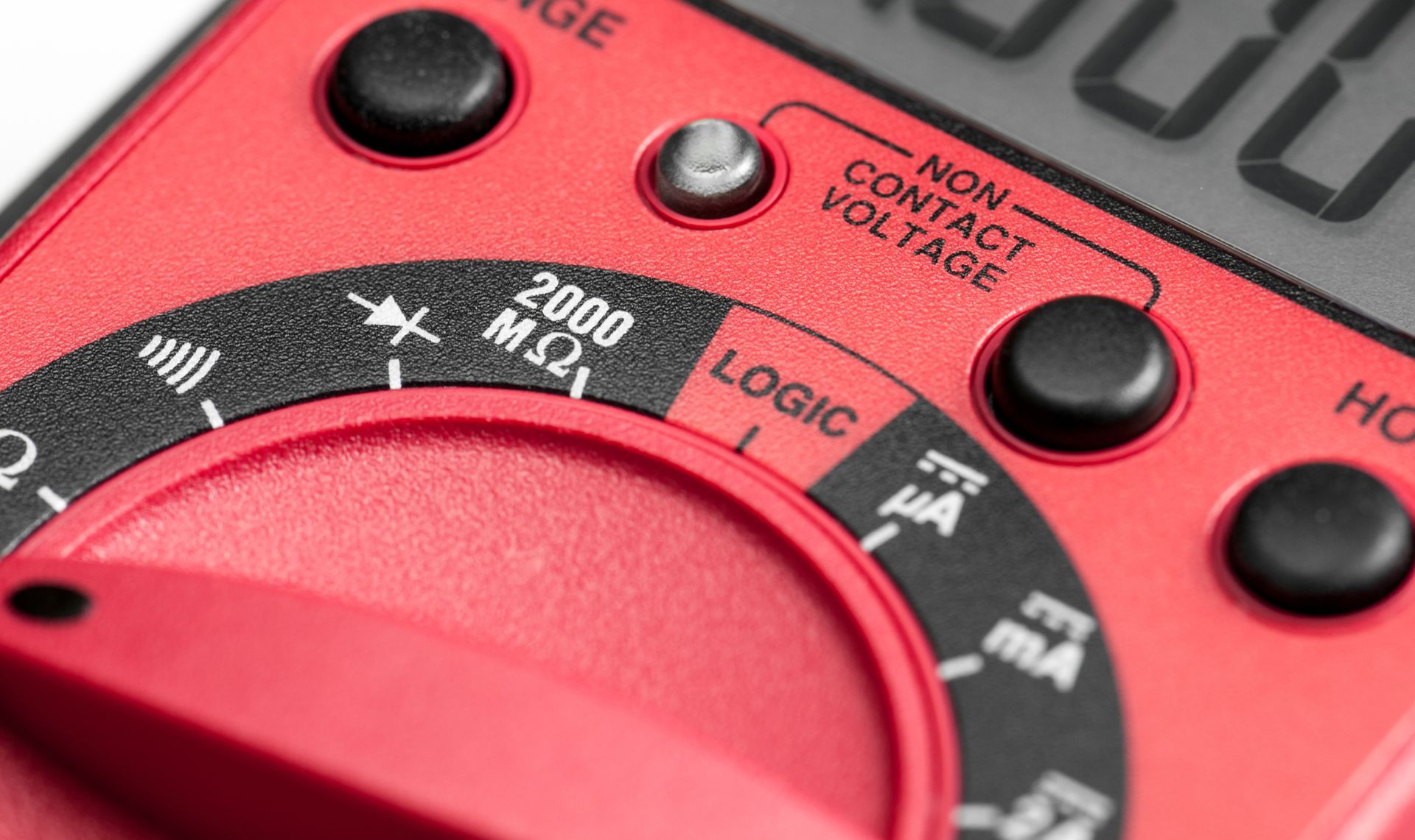 Multimeter wheel detail showcasing precision, representing expert calibration services quality. Multimeter wheel detail showcasing precision, representing expert calibration services quality.
