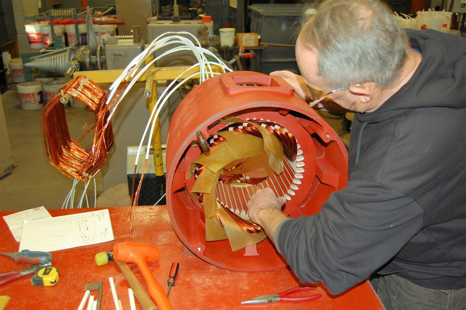 Electric motor stator rewind.