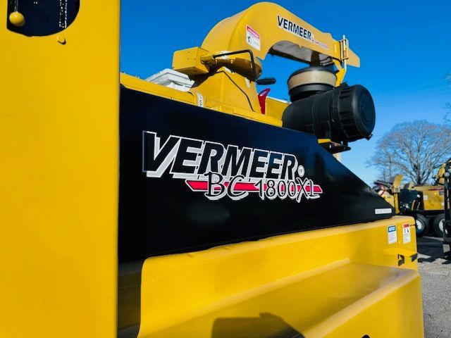A yellow and black machine with the word vermeer on it