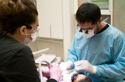 Dr Aman Sabharwal assisting patient