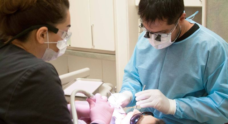 dentist helping child