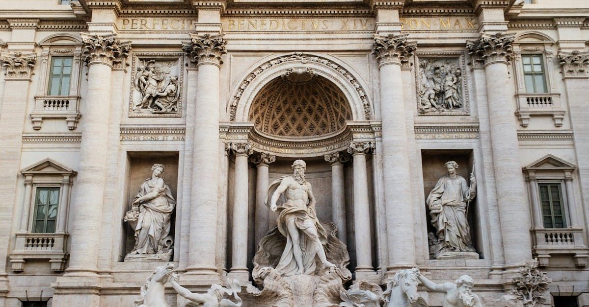 A large building with a fountain in front of it.