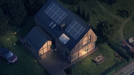 An Aerial View of A House with Solar Panels on The Roof at Night - Hamilton, NZ - Hyperion Electrical
