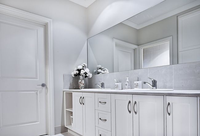 pure white bathroom with mirror