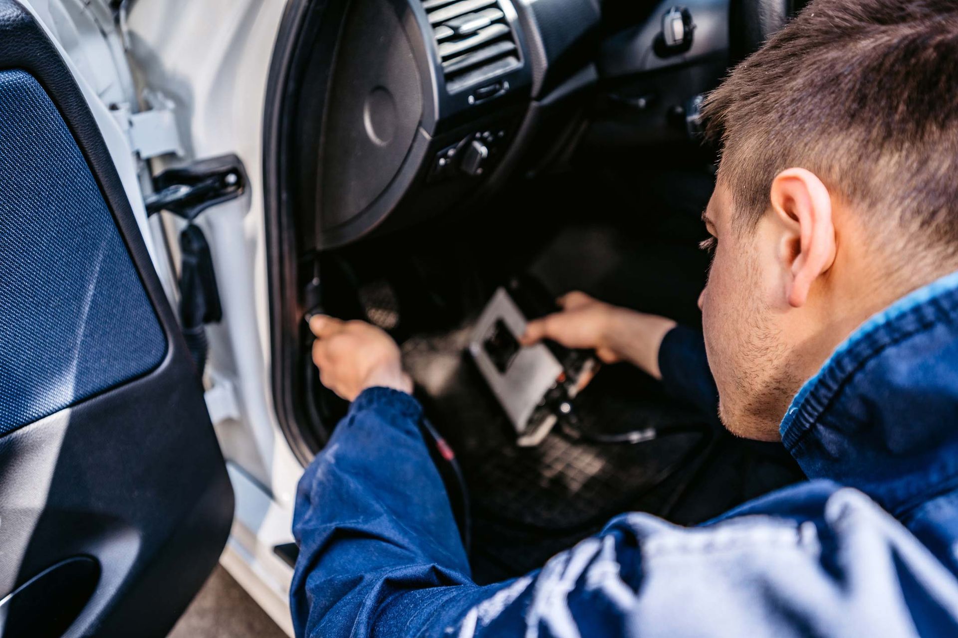 Auto Mechanic Using Car Diagnostic Tool — Wellington, NZ — City Centre Motors