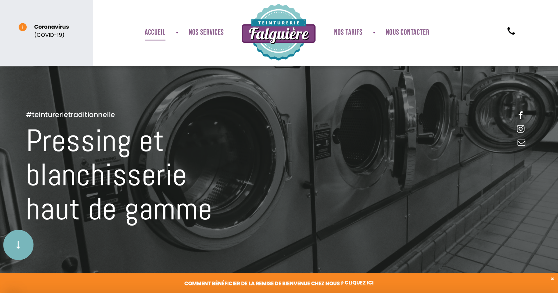 A row of washing machines are lined up in a laundromat.