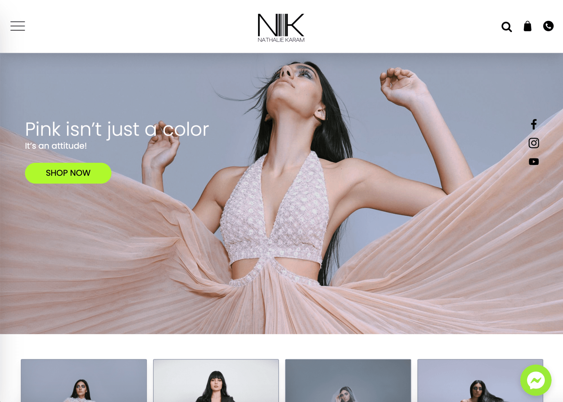 A woman in a pink dress is on the nk website