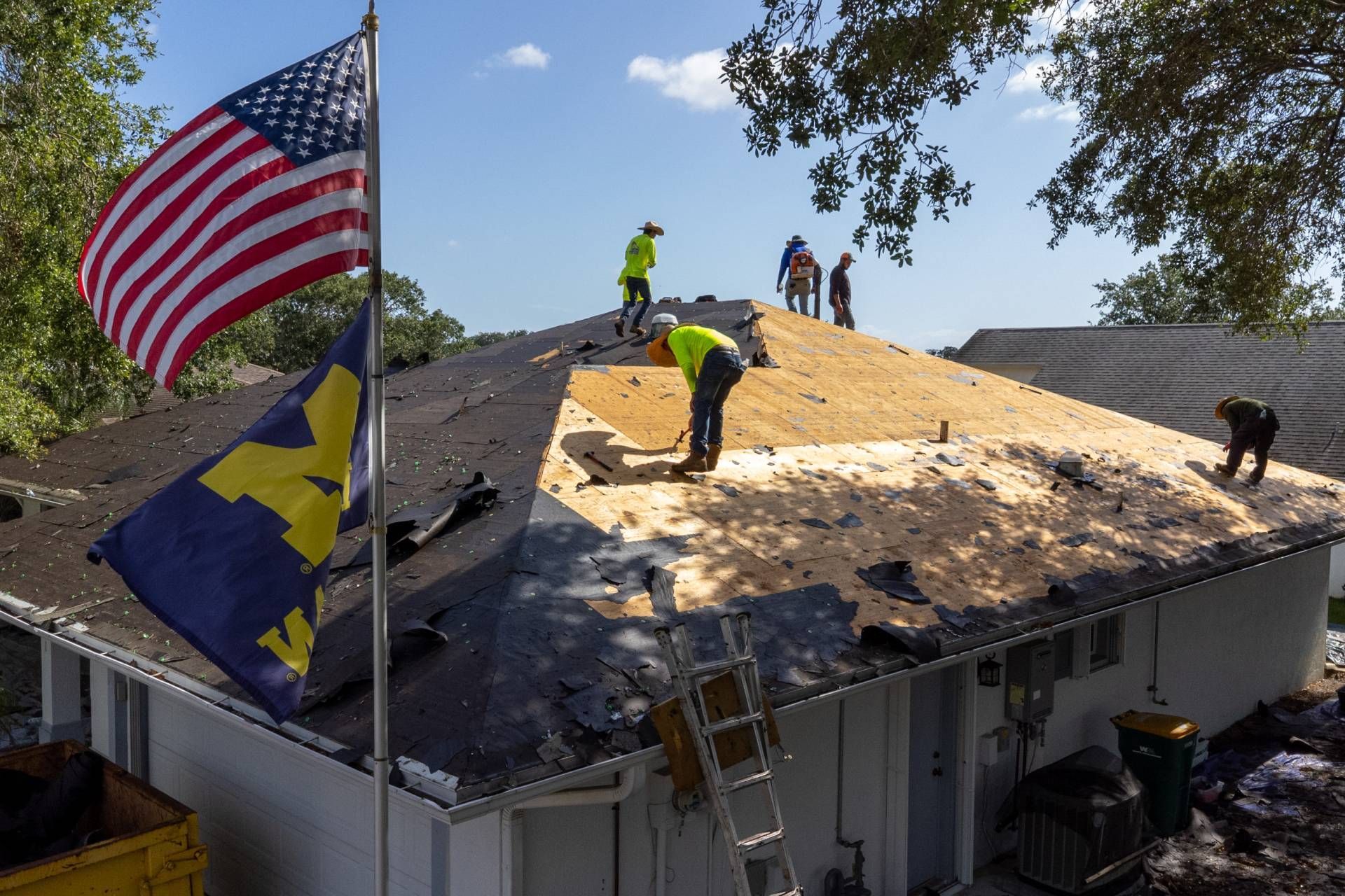 JT Roofing team replacing a roof on a establishment in Melbourne, FL