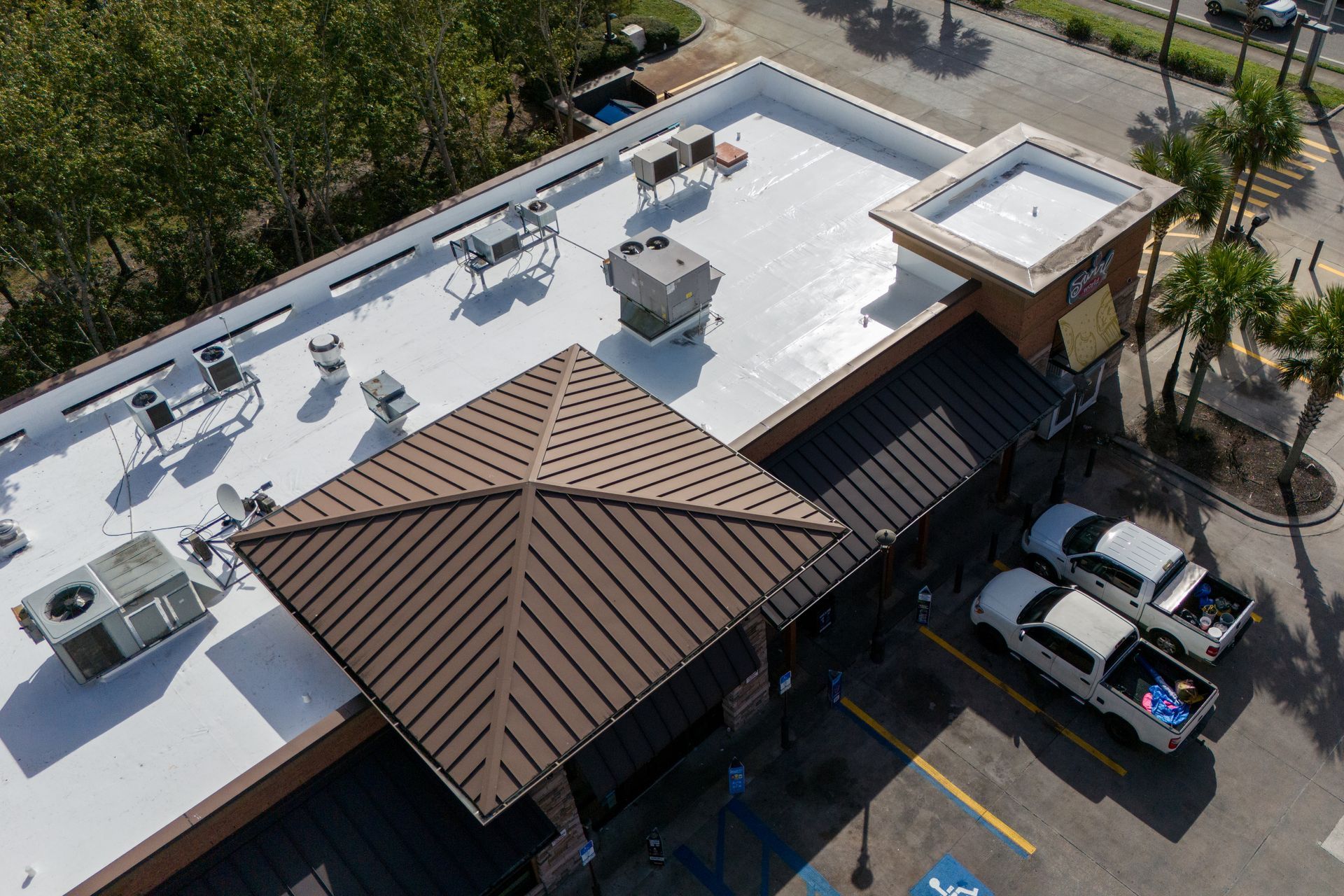 Shingle roof installation on commercial establishment in Melbourne, FL
