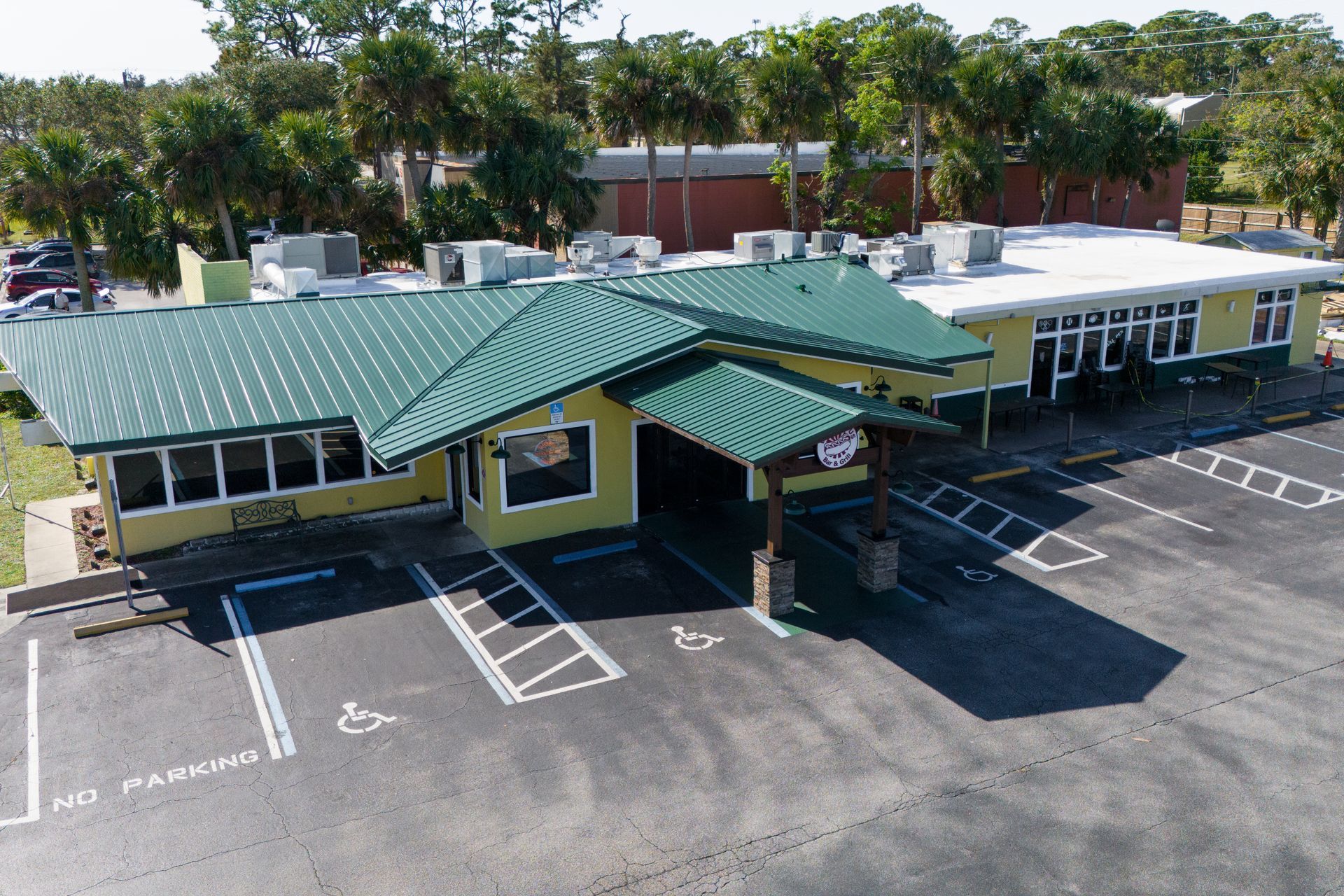 Commercial metal roof replacement Melbourne FL business property