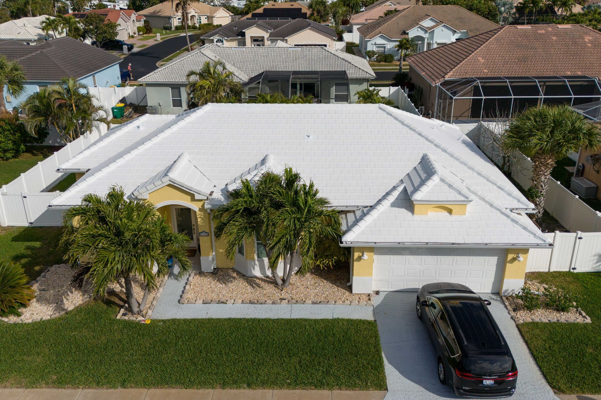 White tile roof installation on residential home Melbourne Brevard County Florida by JT Roofing