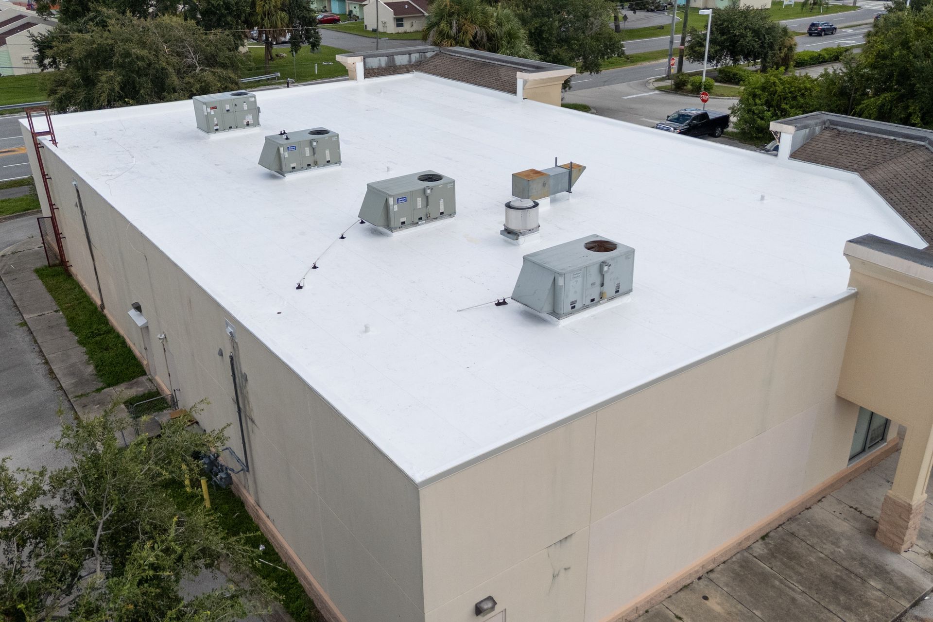 TPO roofing service on commercial building in Melbourne, FL