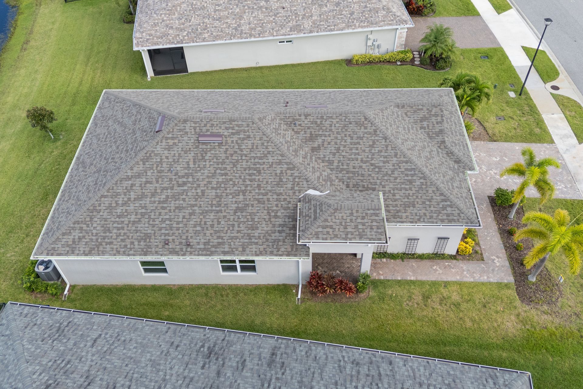 Architectural shingle roof replacement residential home Melbourne Brevard County Florida JT Roofing