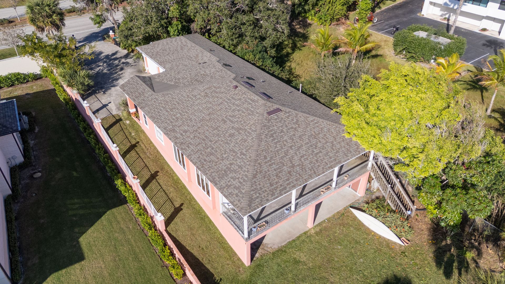 Architectural asphalt shingle roofing on residential home Melbourne Brevard County Florida JT Roofing