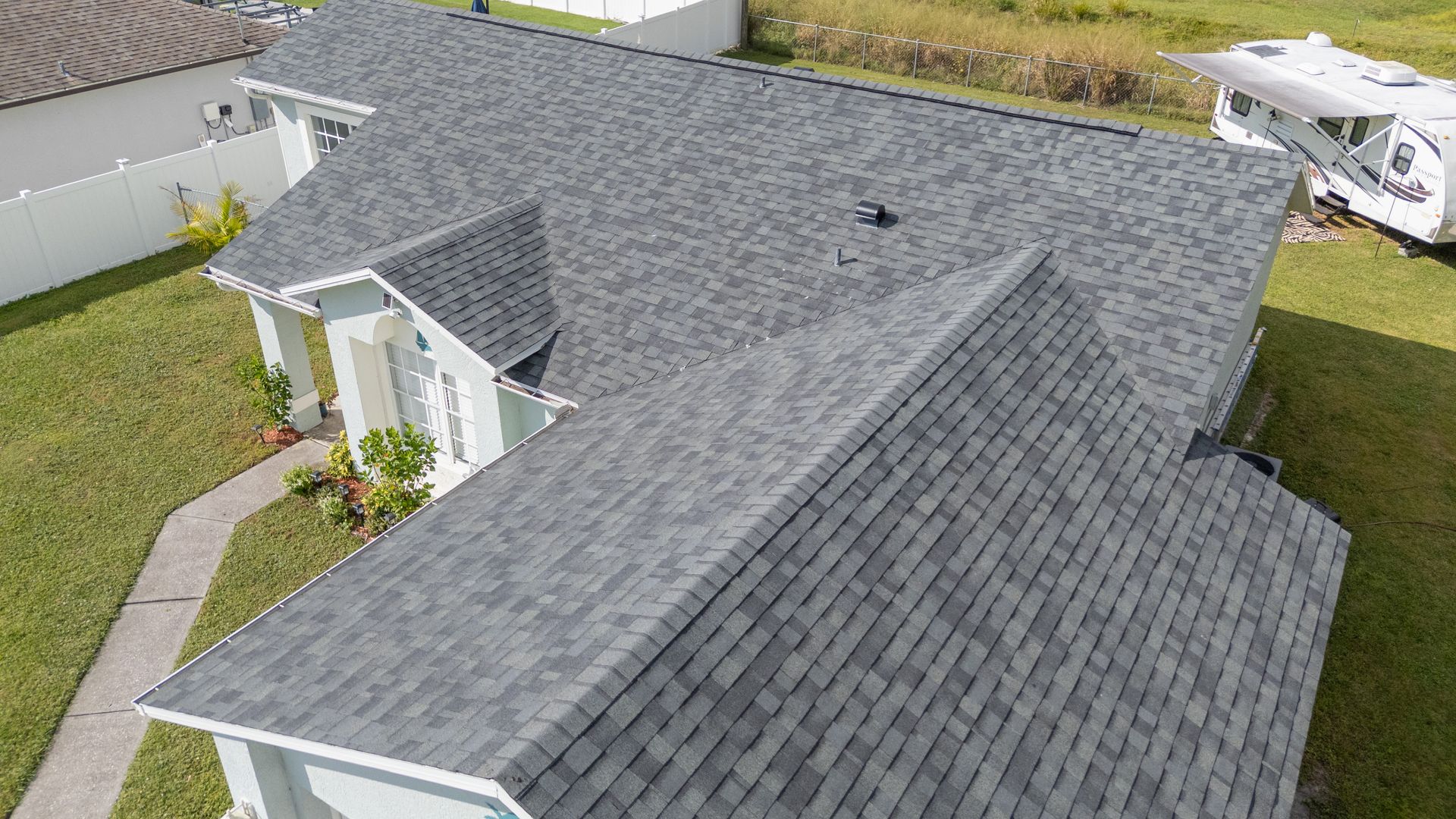 JT Roofing Team replacing a roof in Melbourne, FL