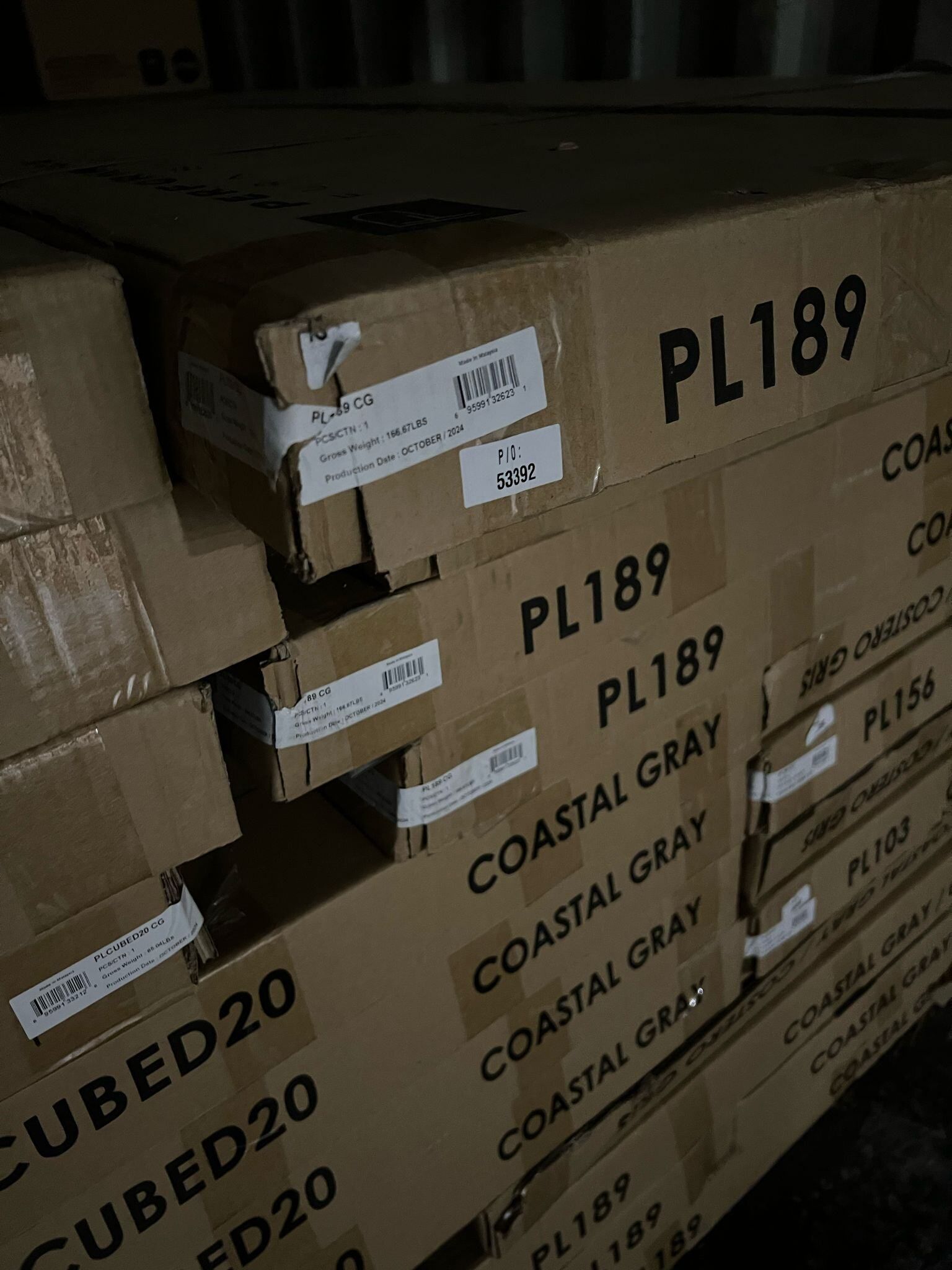 Boxes stacked, labeled 