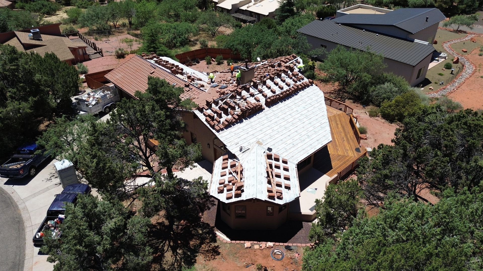 Sedona roofing contractor inspecting home before sale.
