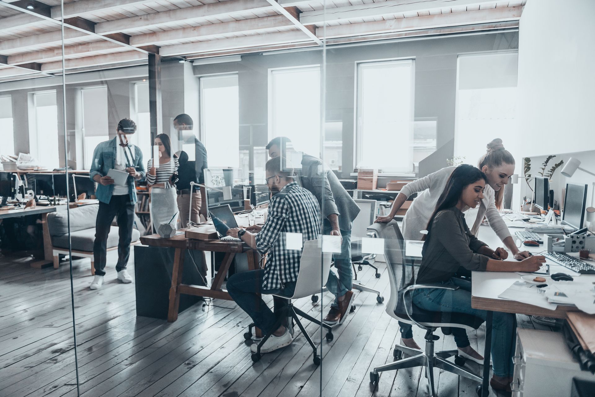 A group of people are working in an office on updated IT infrastructure 