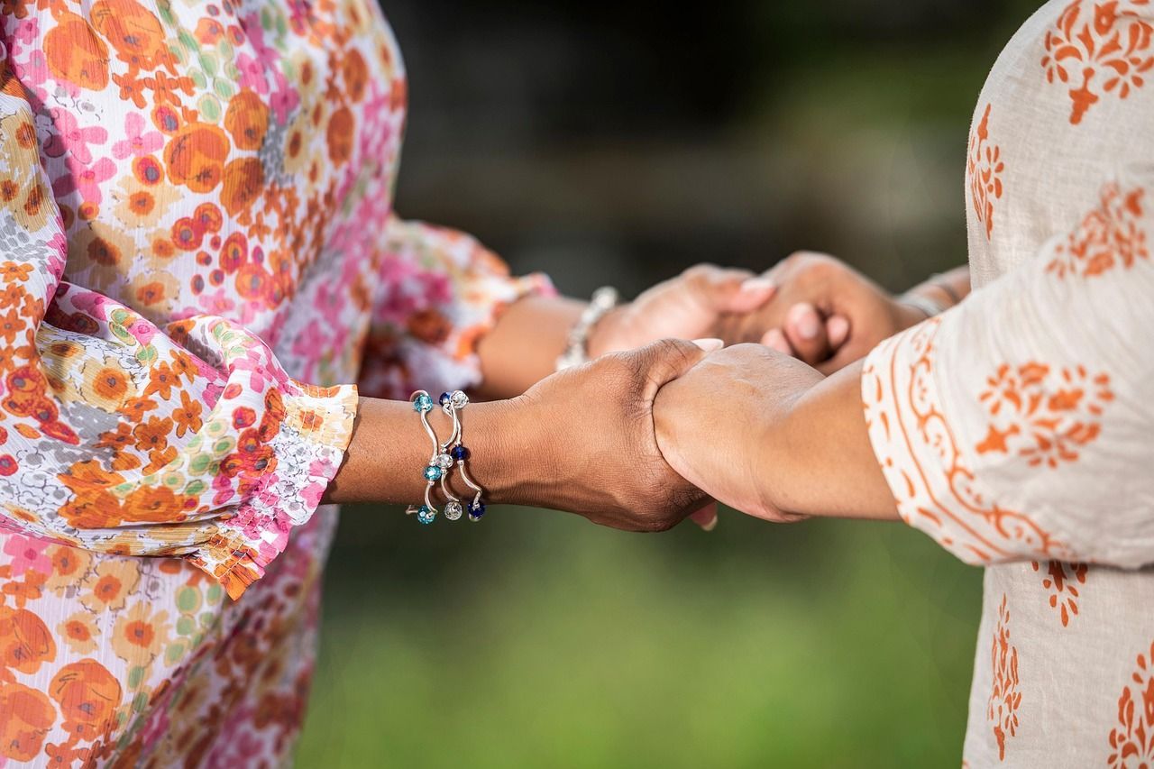 Hands joined together in prayer symbolizing comfort, unity, and cremation services in Edinburg, TX