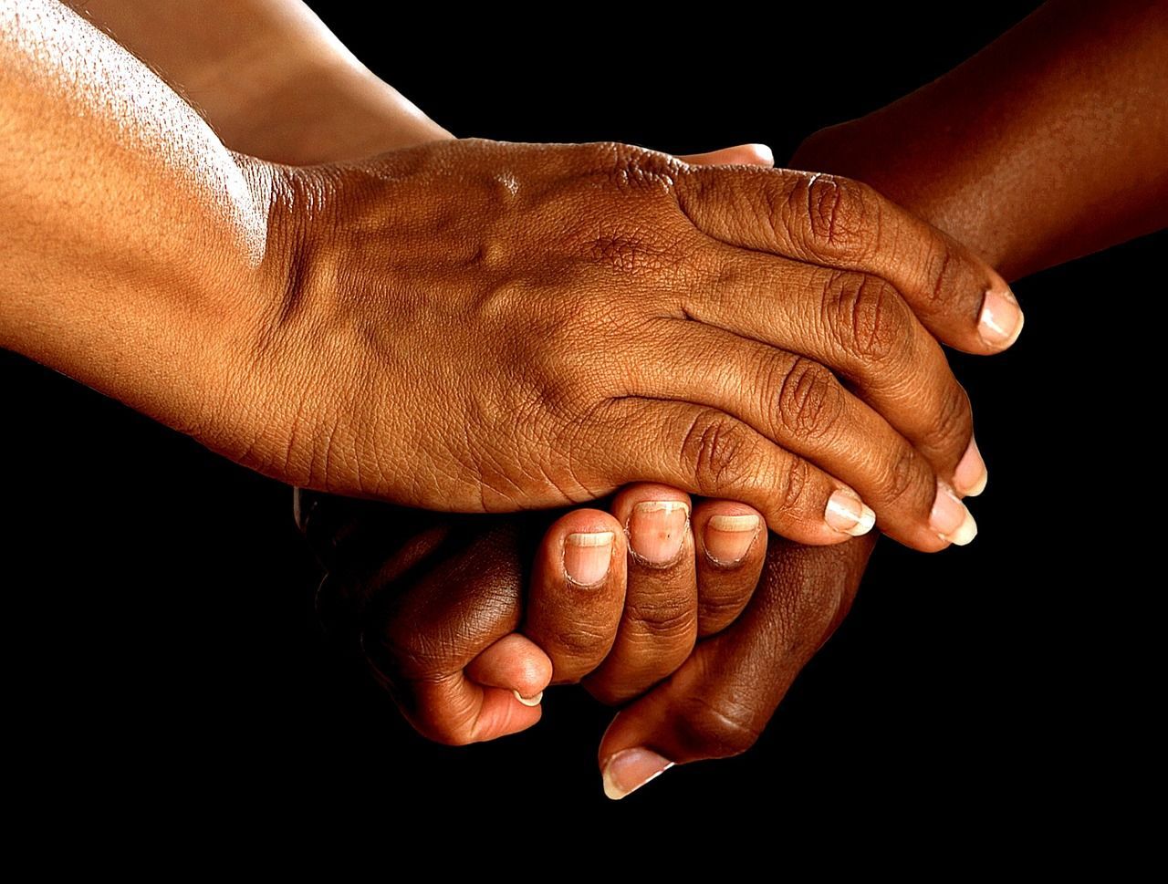 Supportive handshake representing compassion, guidance, and trusted funeral homes in Edinburg, TX