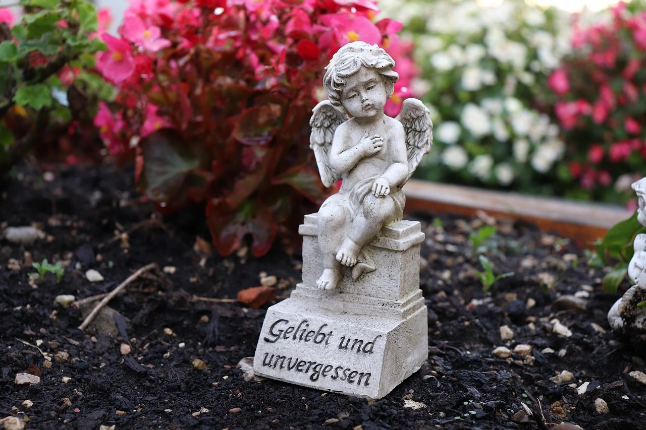 Graveyard scene with disturbed soil representing grief and memory