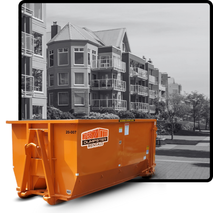 20  cubic yard dumpster in front of a residential building