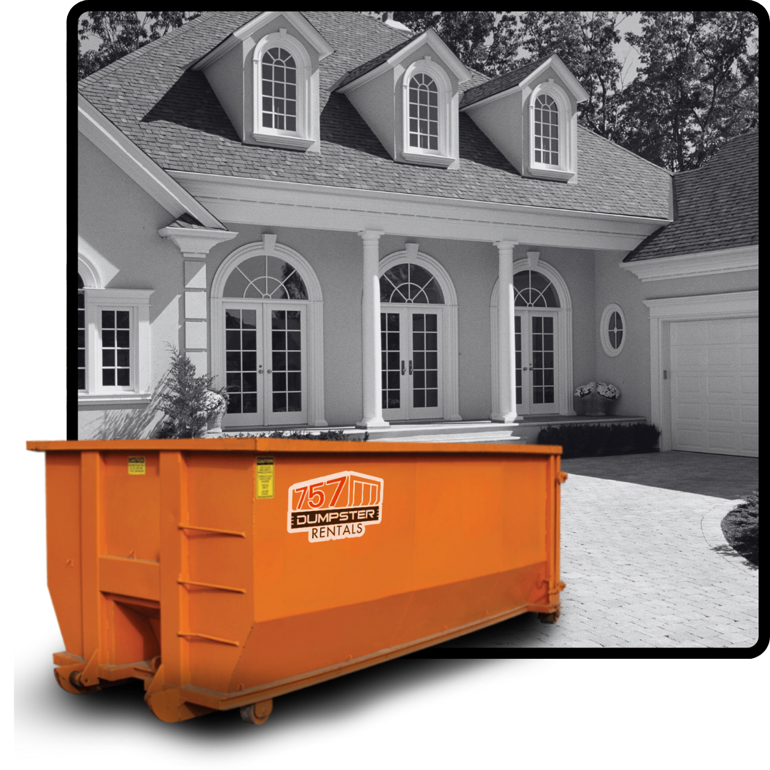 A 757 dumpster in front of a house