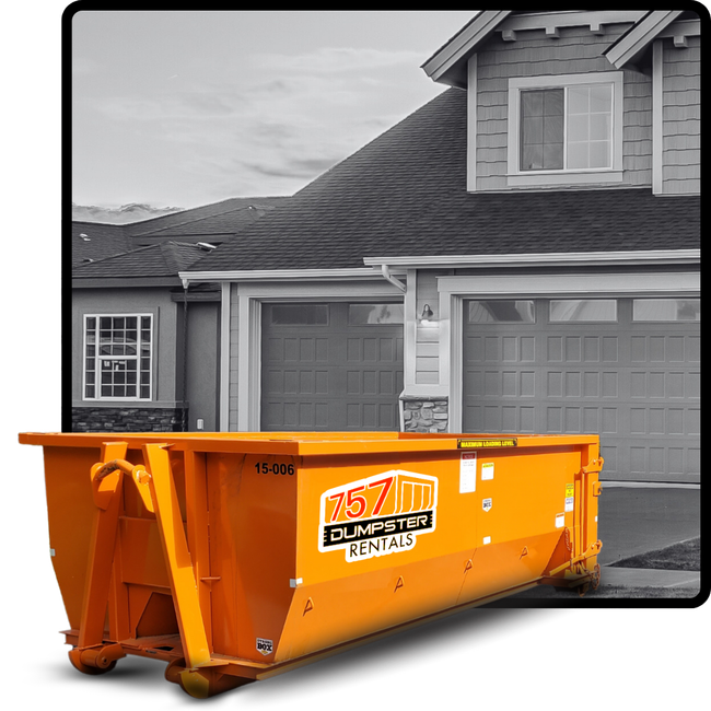 a 757 dumpster truck in front of a house