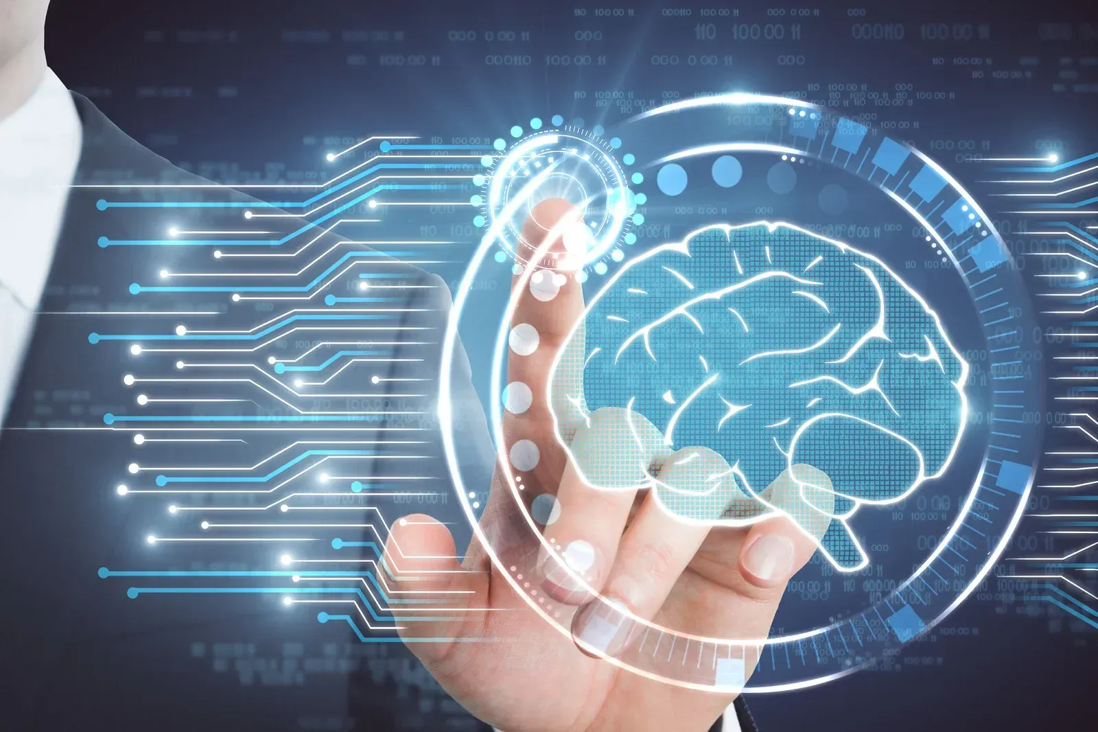 People mingling at an event in a bright, modern space. Tables, windows, and columns are visible.