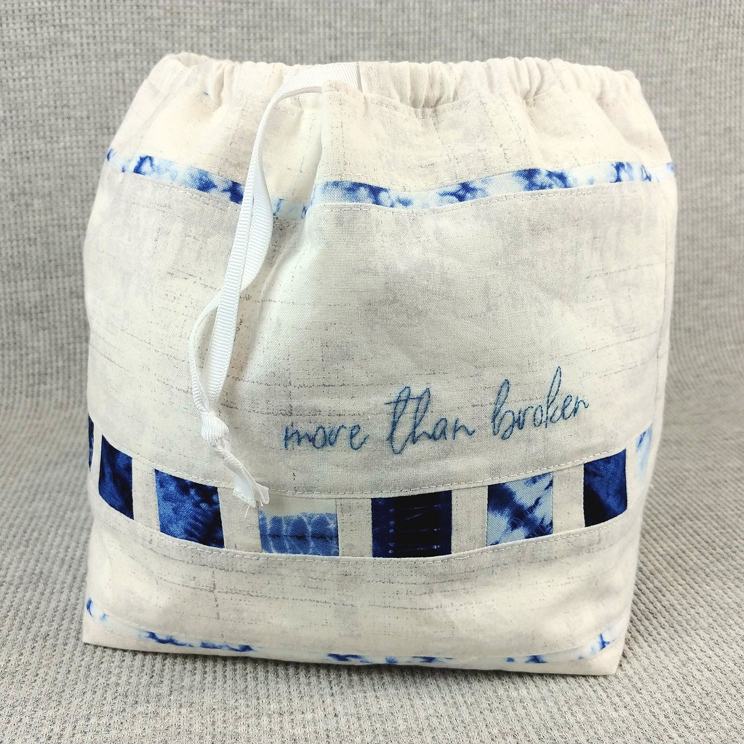 handmade drawstring bag from blue skin yarns story bag kintsugi