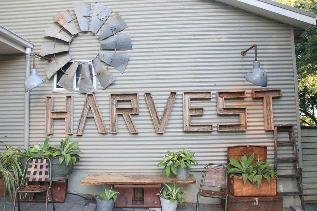 A farmhouse-style wall display with the word 