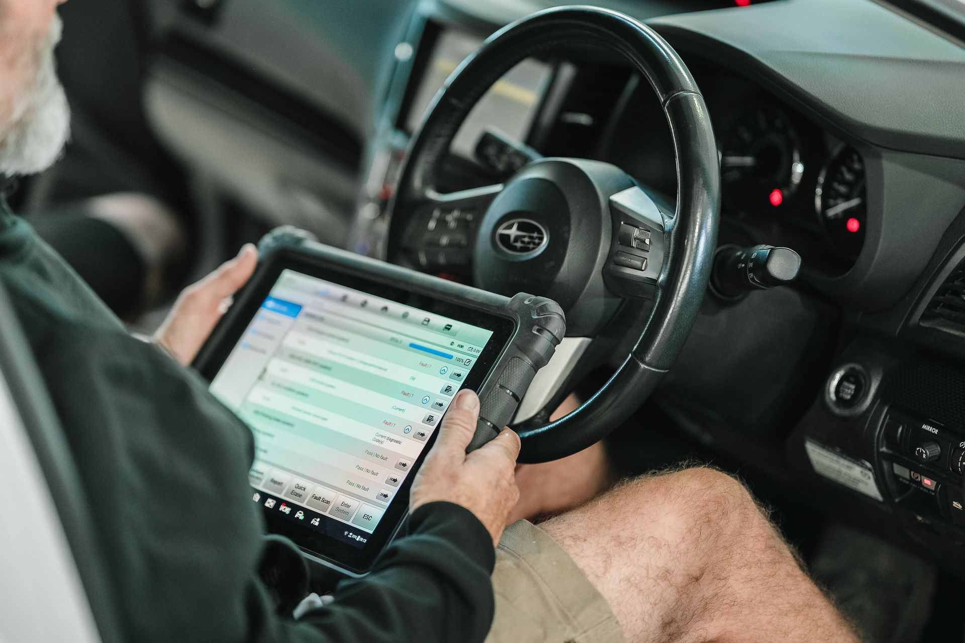 Staff Working on a Car in a Garage — Kingborough, TAS — Kingston Panel & Paint