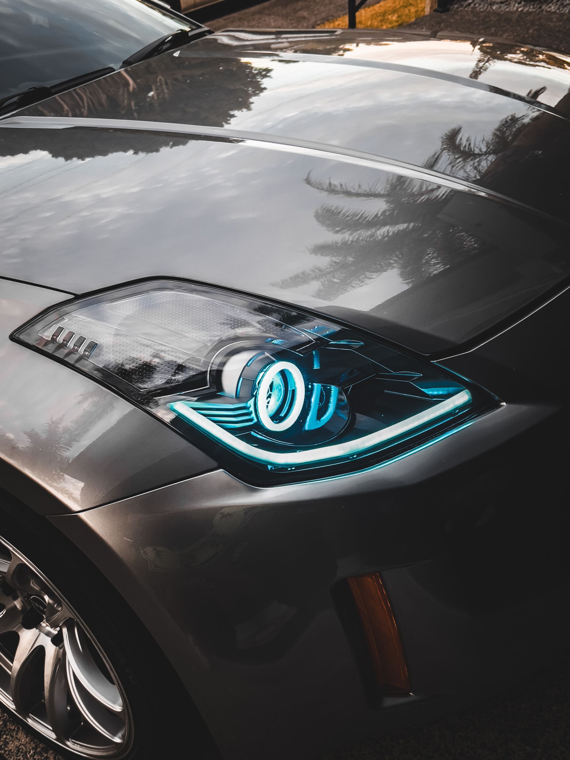 Nissan 350z (facelift) - Gloss Black, RGB Halos, RGB Strip, RGB Demon Eyes, Honeycombed etched lens 