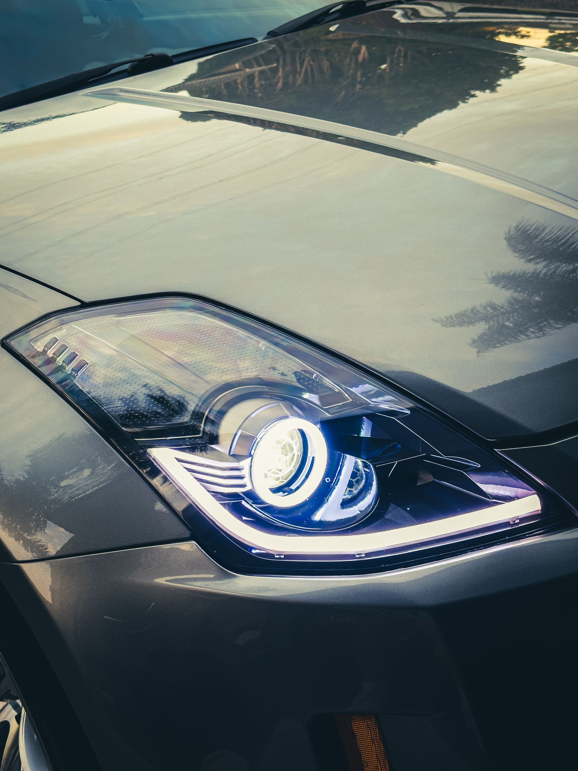 Nissan 350z (facelift) - Gloss Black, RGB Halos, RGB Strip, RGB Demon Eyes, Honeycombed etched lens 