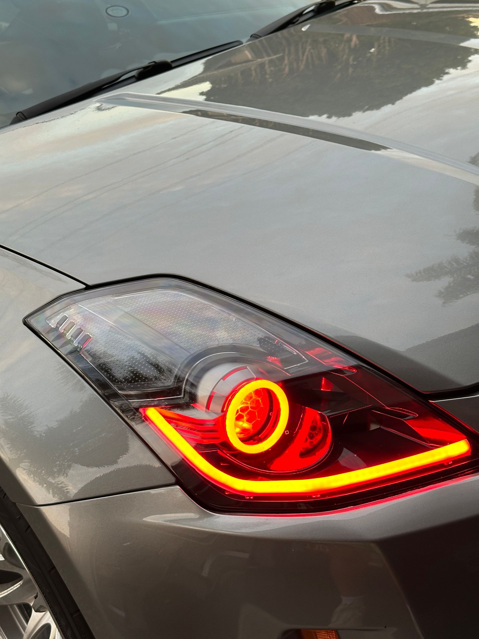 Nissan 350z (facelift) - Gloss Black, RGB Halos, RGB Strip, RGB Demon Eyes, Honeycombed etched lens 