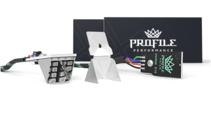 Profile Performance Demon Eye LED kit, including two small light modules, brackets, and branded packaging.