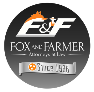 A logo for fox and farmer attorneys at law