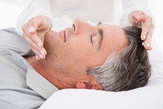 Therapist working with man - Hypnosis & Reiki Services - Lawrenceville, New Jersey