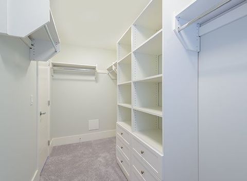 Walk In White Closet — Master Cabinets from Custom Wardrobes in Bundaberg, QLD