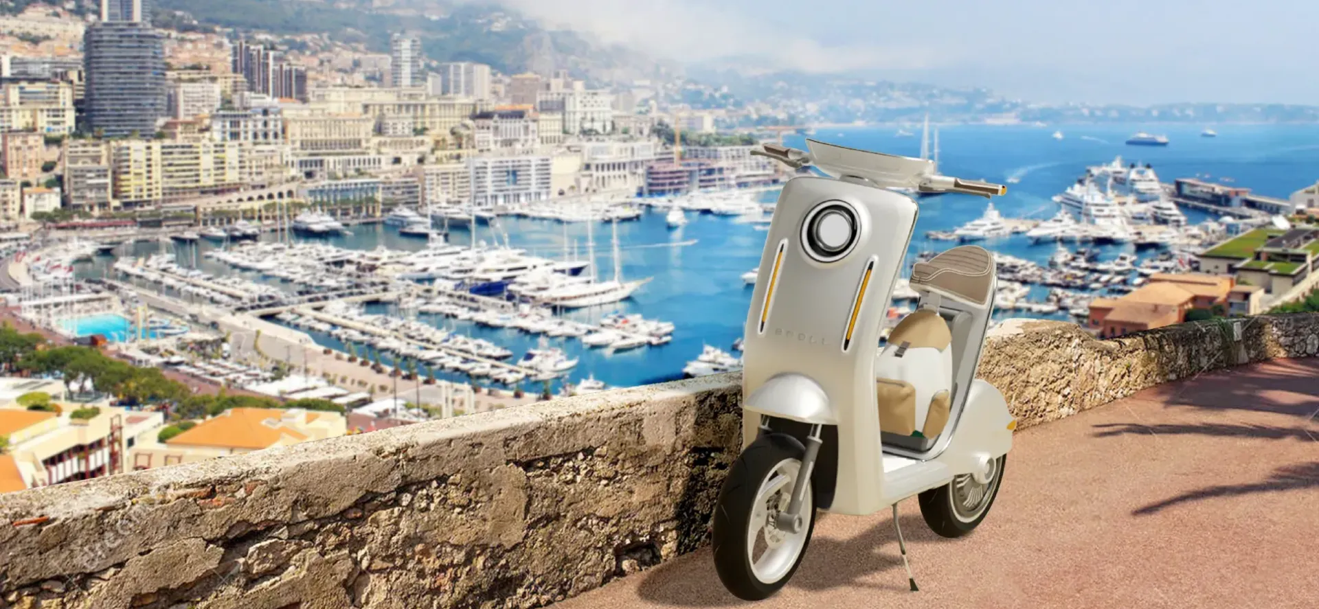 A white Eroll scooter is parked on a wall overlooking a harbor.