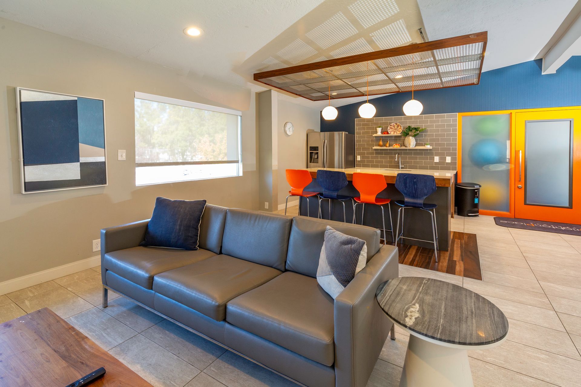 a living room with a couch and a table