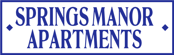 A blue and white sign for springs manor apartments