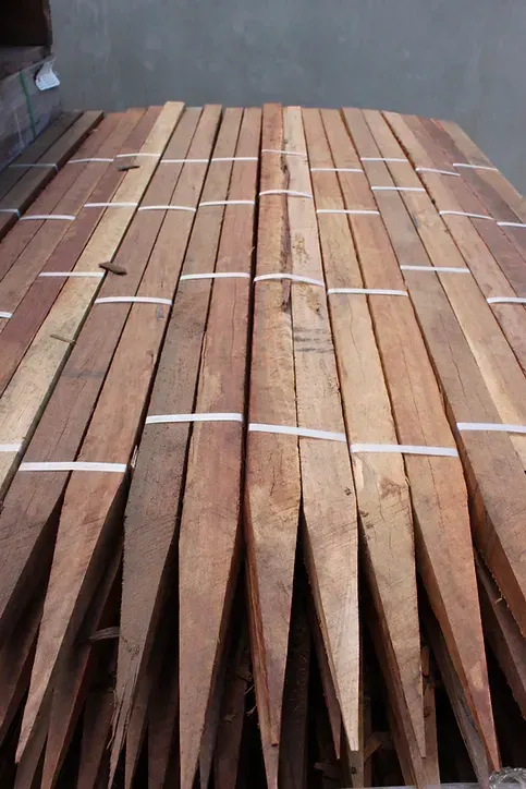 A Stack of Wooden Sticks Tied Together With String — Blue River Landscape Supplies in Foulden, QLD