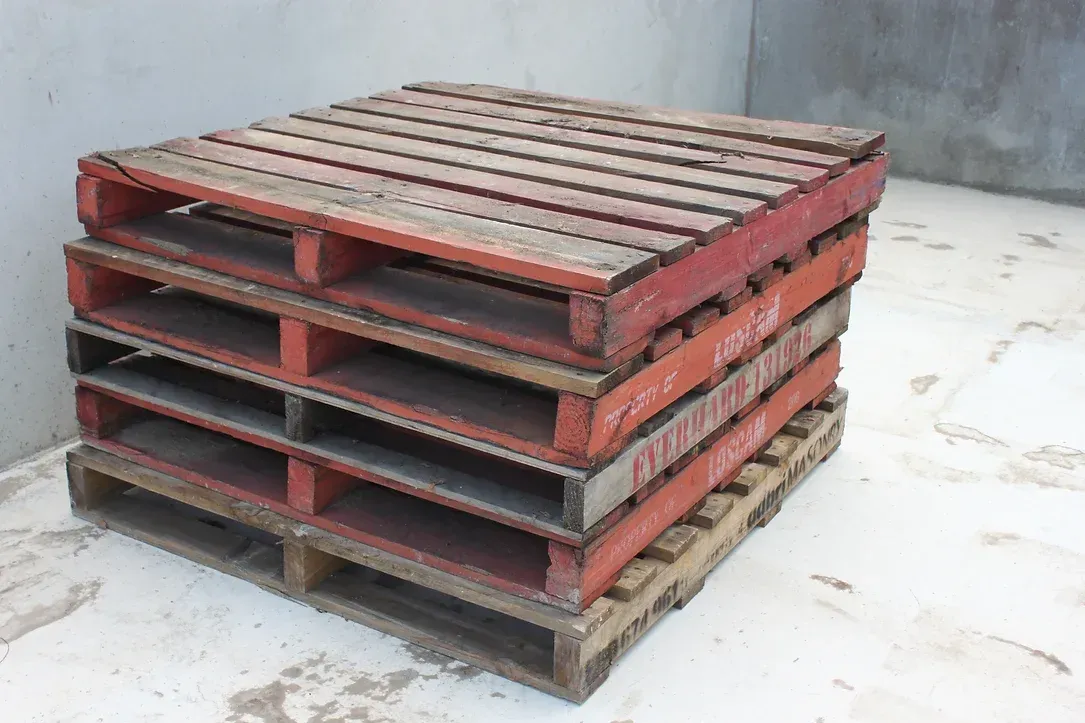 Three Wooden Pallets Are Stacked on Top of Each Other — Blue River Landscape Supplies in Foulden, QLD