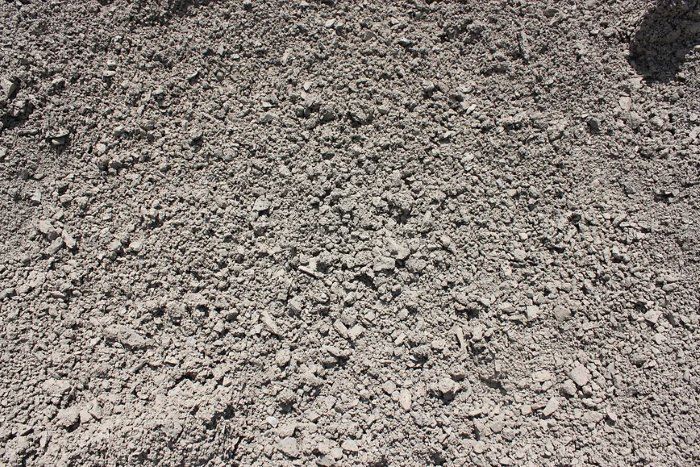 A Black and White Photo of a Pile of Roadbase Premium — Blue River Landscape Supplies in Foulden, QLD